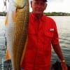 Frank Bunyard of Tarkington Prairie TX caught and released this nice 32inch bull red he took on a finger mullet