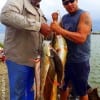 Grand Slam on a stringer- Fishin buds Connerel Brown and Adrian Reyes of Wallis TX tethered up reds, flounder, and trout for this Texas Grand Slam catch