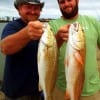 Lester Moody and Cody Holt of New Caney TX took these 22 and 27inch reds on finger mullet