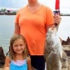 Mom and daughter- 5yr old Karisyn gives mom, Amanda Armstrong of Crosby TX a big thumbs up for her 27inch drum she caught and released on shrimp