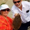 Mr and Mrs Riewe of Houston teamed up to catch this nice flounder on live shrimp
