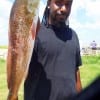 Pedro Willis of Houston landed this 24 inch slot red while fishing a finger mullet