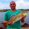 Scott Dickens of Channelview TX nabbed this nice 26inch slot red while fishing finger mullet