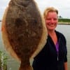 Spring TX angler Michelle Barth fished her special rig of catfish bait and Berkely Gulp for this nice flounder