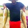 Xavier Dent of Houston fished cut mullet to snatch up these 25 and 27inch slot reds