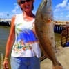 7 points TX anglerette Dana Lee landed this really nice 24inch slot red she took on a finger mullet