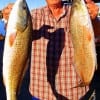 Bob Billimer of Maude TX corraled these two nice slot reds on cut croaker