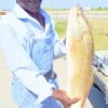Booker Accie of Houston took this nice 28inch slot red on shrimp