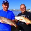 Brother anglers Dean and Dennis McPhearson of Beaumont TX took these nice 25 and 26inch slot reds on live croaker
