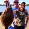 Fishin gals Paige West and Renee Wells teamed up to catch this nice flounder on a finger mullet
