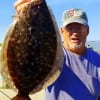 HOOAH grunts retired Army Sgt James Fontenot of Alvin TX who took this flatfish on a Gulp