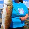 Heather Bailey of Chickasha OK caught this nice 25inch slot red on a finger mullet