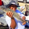 Houston anglerette Tiffany Henderson fished cut mullet to land this nice 19inch speckled trout
