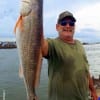 Jasper TX angler Mitch Clay bulldogged this nice 23inch slot red by fishing with a Miss Nancy mud minnow