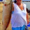 Kristina Milburn of Baytown TX nabbed this nice 28inch slot red on a finger mullet