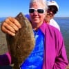 Lawana Goodrow with hubby Mark show off her nice flounder she caught on live shrimp