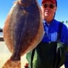 Montgomery TX angler Bill Taylor finessed a Berkley Gulp to nab this nice flounder