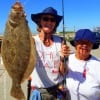 Mother and Daughter fishing team Dana Lee and Sandra Williams of 7 points TX show off Dana's nice flounder she caught on a finger mullet