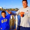 Murphy and Murphy of Batson TX show off their 20-21-and 22inch specks caught on a T-18 MirrOlure