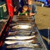 Night-shift angler Tony Mazzola -and kids- of Hamshire TX tailgated this mess of trout and flounder fishing Berkely Gulp