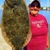 Poochie Walker of League City TX nabbed this nice flounder on Berkely Gulp