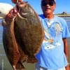 Rollover Angler Henri Fontenot managed to massage gulps along the bulkhead for these nice flounder