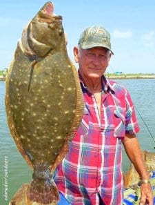Saddle Blanket Flounder such as this 8-plus pounder are caught at Rollover
