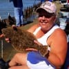 Sheri O'Neal of Santa Fe TX nabbed this nice flounder while fishing a finger mullet
