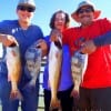 The Carrasco Famlia of Pasadena TX display their catch of reds and drum they took on shrimp