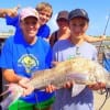 The Shultz Family of FT Worth TX help 12yr old Madison with her 28inch black -croaker- drum she caught on shrimp