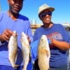 The fishing team of Johnny and Debra De' Shazor of Houston took these trout and red on cut bait and shrimp