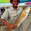 This nice 27inch slot red was caught on a finger mullet by MiKayla Potts of Houston