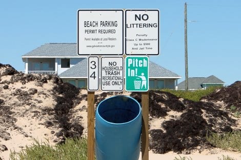 New "No Littering" signs have been placed on the beach to remind people to pick up their trash.