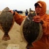 A chilly Rollover angler Robert Aguirre worked Berkley Gulp along bayside bulkheads to catch this 22 and 19 inch flounder