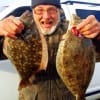 BUT I AM SMILING growled Richard Hutchins of Liberty TX while showing off these nice flounder he caught on Berkley Gulp