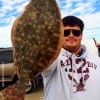 Blake Shelton of Cypress TX landed this nice 18inch flounder while fishing live shrimp
