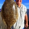 Crystal Beach TX angler Roudy Braud massaged a Berkley Gulp along the bottom to hook this really nice 21inch doormat flounder
