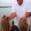 Ed Bilecki of Houston nabbed these two nice flounder on Miss Nancy's mud minnows
