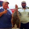 Fishin pals Tony Mazolla of Hamshire and Father Joe of St Anthony's Beaumont took these fine flounder including the very first flounder for father Joe