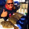 Gilchrist Anglerette Terrie Riley nabbed these nice flounder on Berkley Gulp