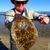 Gilchrist TX angler Terry Weir wade-fished Rollover Bay with Berkley Gulp to nab this nice flounder