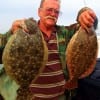 Gilchrist angler Rusty Schley nabbed these 20 and 19 inch flounder on Berkley Gulp