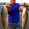 Live shrimp enticed these 23 and 27inch slot reds for Eli Peralta of Humble TX