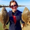 Marte Ayala of The Woodlands TX shows off her very first flounder she caught on shrimp