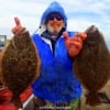 Mitch Clay of Jasper TX took these 19 and 20 inch flounder on Miss Nancy finger mullet