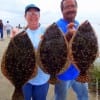 OH WELL- Don Kernan seems to griping- after his wife Cheryl WHUPPED him again with these 20 and 18 inch flounder she caught on Berkley Gulp
