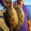 Port Bolivar TX angler Don took these 20 and 18 inch flounder while fishing Berkley Gulp