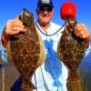 Rollover angler Chuck Meyers nabbed these 21 and 18 inch flounder on Berkley Gulp