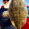 Rollover angler Tommy Bell landed this 25 inch 5.6 lb saddle blanket flounder while fishing a Miss Nancy finger mullet