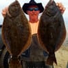 Santa Fe angler Charles O'Neal waded Rollover Bay with Berkley Gulp to nab this 22 and 23 inch flatfish